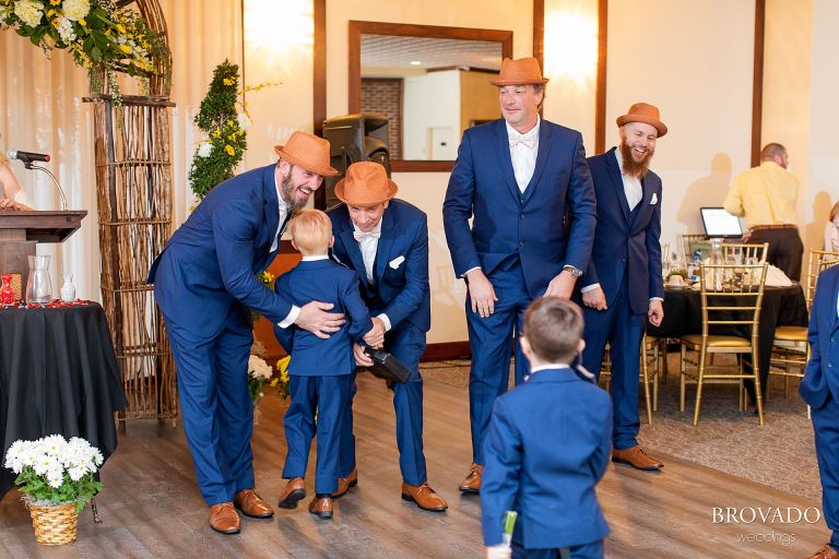 Groom greeting ring bearers