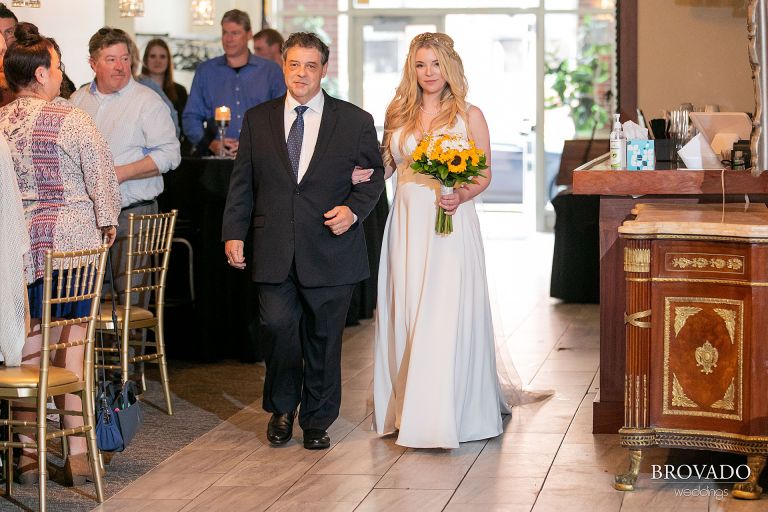 Bride and her father walking down the aisle