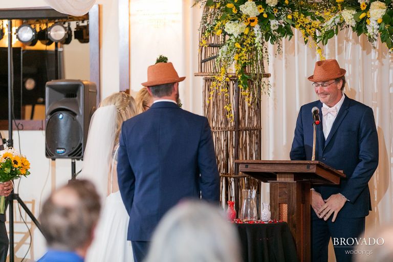 Groomsman giving a speech during wedding ceremony