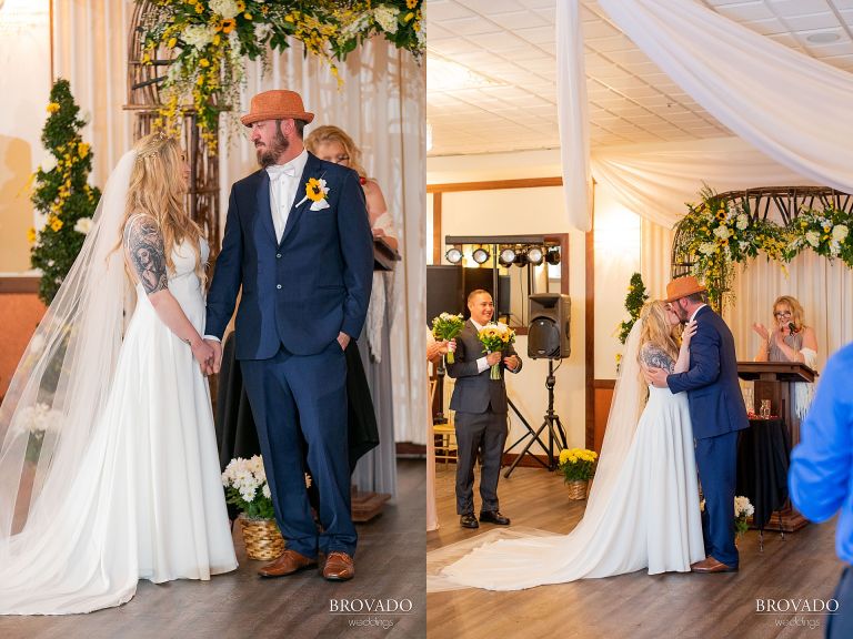 Bride and groom share first kiss