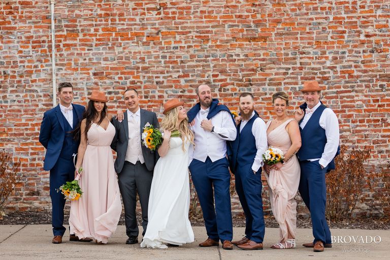 Wedding party posing outside