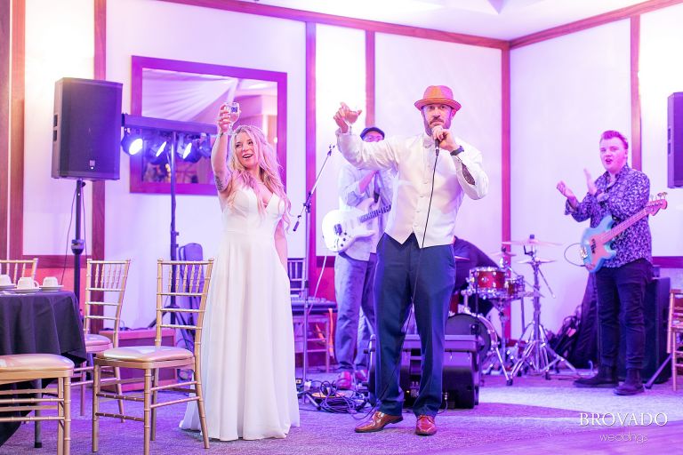 Bride and groom giving a toast