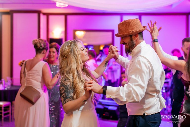 Bride and groom dancing together